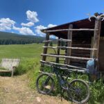 bicycle by cabin in the mountains